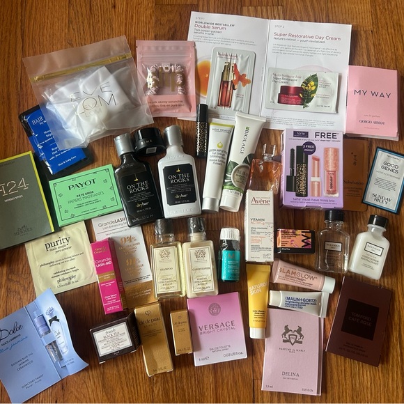 NWT 40+ bundle of travel sized luxury beauty products - Cle de Peau Eve Lom etc